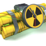 A bomb with a clock on it and some wires around the base.