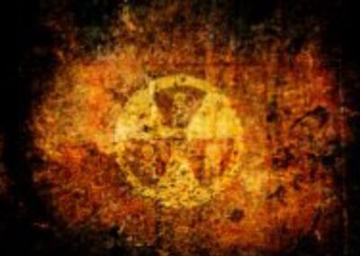 A radioactive symbol painted on the side of a wall.